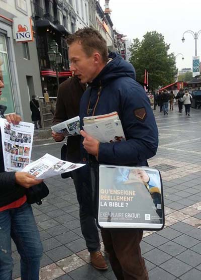 Human Rights activists rally in front of the EU Parliament to denounce the MKO