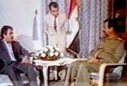 cooperating with Saddam Hussein